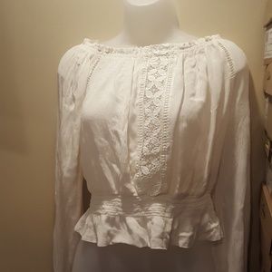Divided off white / cream coloured looking top.